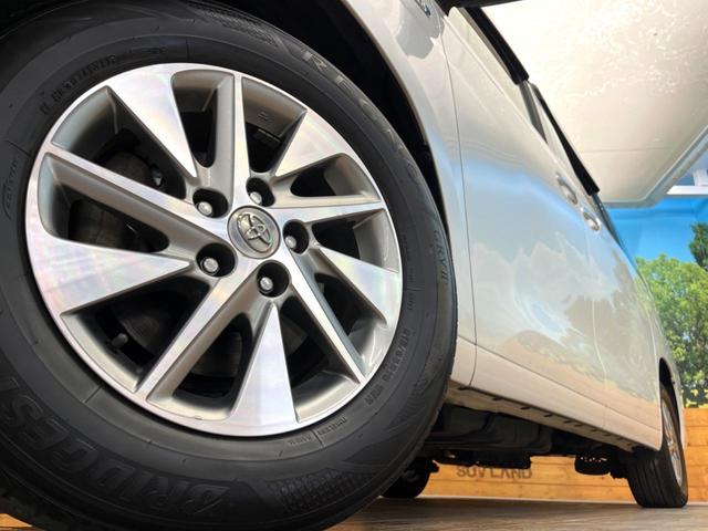 ヴェルファイアハイブリッド Ｘ　禁煙車　８インチナビ　４ＷＤ　バックカメラ　フリップダウンモニター　両側電動スライドドア　ＥＴＣ　クリアランスソナー　衝突安全ボディ　横滑り防止　オートライト　純正１６インチアルミ（14枚目）
