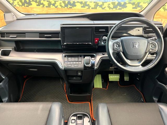ステップワゴンスパーダ e:HEVスパーダ G・EX ホンダセンシング 両側電動ドア 後席モニター 全周囲カメラ 衝突被害軽減システム レーダークルーズ 禁煙車 ハーフレザーシート スマートキー LEDヘッド ETC2.0 車線逸脱警報 オートライト デュアルエアコン(2枚目)