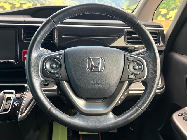 ステップワゴンスパーダ e:HEVスパーダ G・EX ホンダセンシング 両側電動ドア 後席モニター 全周囲カメラ 衝突被害軽減システム レーダークルーズ 禁煙車 ハーフレザーシート スマートキー LEDヘッド ETC2.0 車線逸脱警報 オートライト デュアルエアコン(11枚目)