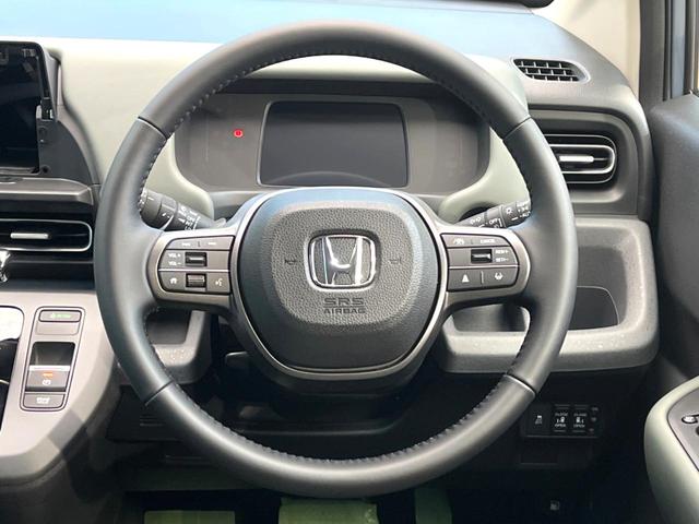 フリード クロスター 登録済未使用車 ホンダセンシング 両側電動スライドドア LEDヘッド&フォグ アダプティブクルーズ 純正15インチアルミ スマートキー オートエアコン シートヒーター オートハイビーム BSM(11枚目)