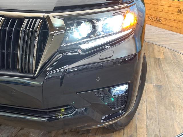 ランドクルーザープラド TX Lパッケージ 70thアニバーサリーリミテッド 禁煙車 サンルーフ 4WD メーカー純正9インチナビ バックカメラ プリクラッシュセーフティ レーダークルーズ 茶革シート シートヒーター LEDヘッド スマートキー 純正18インチアルミ(13枚目)