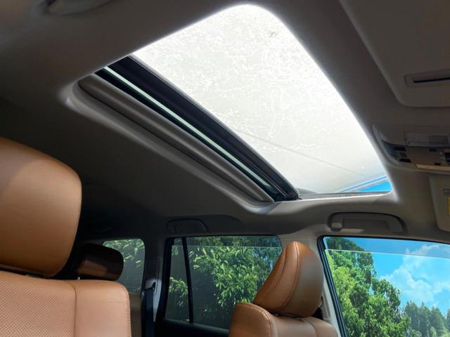 ランドクルーザープラド TX Lパッケージ 70thアニバーサリーリミテッド 禁煙車 サンルーフ 4WD メーカー純正9インチナビ バックカメラ プリクラッシュセーフティ レーダークルーズ 茶革シート シートヒーター LEDヘッド スマートキー 純正18インチアルミ(69枚目)