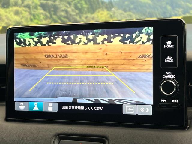 ヴェゼル ｅ：ＨＥＶ　Ｘ　禁煙車　メーカー純正９インチナビ　バックカメラ　ホンダセンシング　レーダークルーズ　オートマチックハイビーム　クリアランスソナー　ＬＥＤヘッド　ＥＴＣ　スマートキー　純正１６インチアルミ（4枚目）