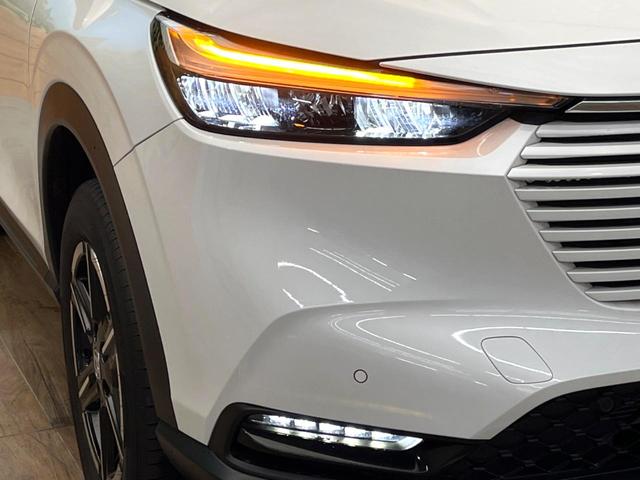 ヴェゼル ｅ：ＨＥＶ　Ｘ　禁煙車　メーカー純正９インチナビ　バックカメラ　ホンダセンシング　レーダークルーズ　オートマチックハイビーム　クリアランスソナー　ＬＥＤヘッド　ＥＴＣ　スマートキー　純正１６インチアルミ（12枚目）