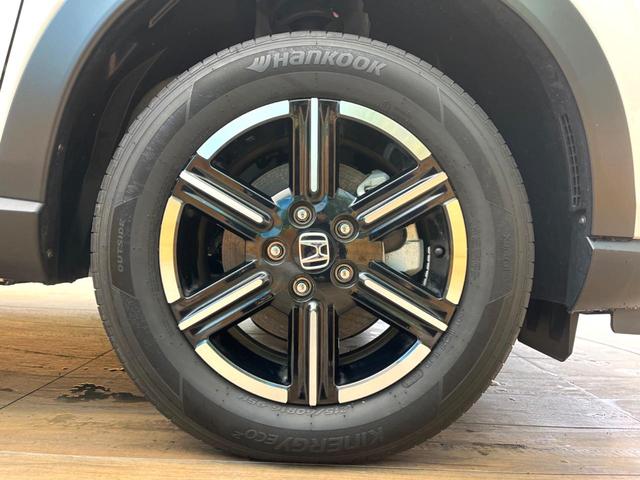 ヴェゼル ｅ：ＨＥＶ　Ｘ　禁煙車　メーカー純正９インチナビ　バックカメラ　ホンダセンシング　レーダークルーズ　オートマチックハイビーム　クリアランスソナー　ＬＥＤヘッド　ＥＴＣ　スマートキー　純正１６インチアルミ（30枚目）