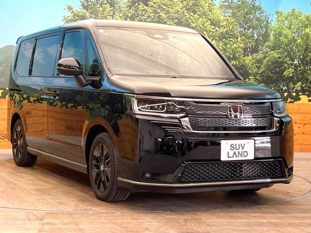 ステップワゴン ｅ：ＨＥＶスパーダ　禁煙車　ナビ付　バックカメラ　ホンダセンシング　レーダークルーズ　両側電動スライドドア　ブラインドスポットモニター　パワーバックドア　ＬＥＤヘッド　ＥＴＣ　スマートキー　純正１６インチアルミ（26枚目）
