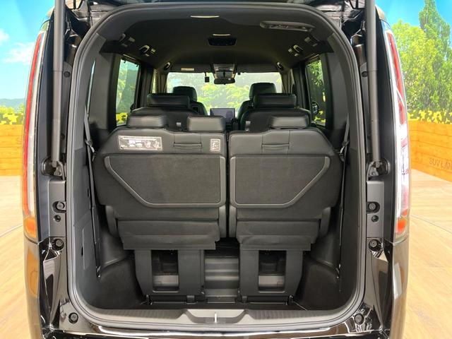 ステップワゴン ｅ：ＨＥＶスパーダ　禁煙車　ナビ付　バックカメラ　ホンダセンシング　レーダークルーズ　両側電動スライドドア　ブラインドスポットモニター　パワーバックドア　ＬＥＤヘッド　ＥＴＣ　スマートキー　純正１６インチアルミ（63枚目）