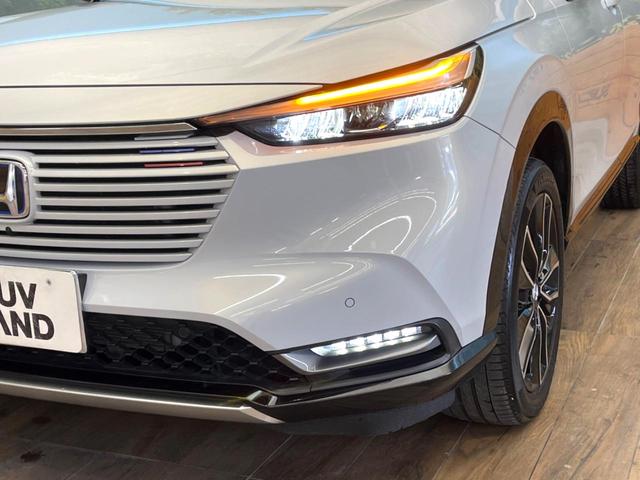 ヴェゼル e:HEV PLaY 禁煙車 メーカー純正9インチナビ サンルーフ 全周囲カメラ パワーバックドア オートマチックハイビーム 横滑り防止 LEDヘッド ETC ドラレコ スマートキー 純正18インチアルミ(12枚目)