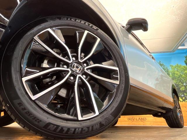 ヴェゼル e:HEV PLaY 禁煙車 メーカー純正9インチナビ サンルーフ 全周囲カメラ パワーバックドア オートマチックハイビーム 横滑り防止 LEDヘッド ETC ドラレコ スマートキー 純正18インチアルミ(13枚目)