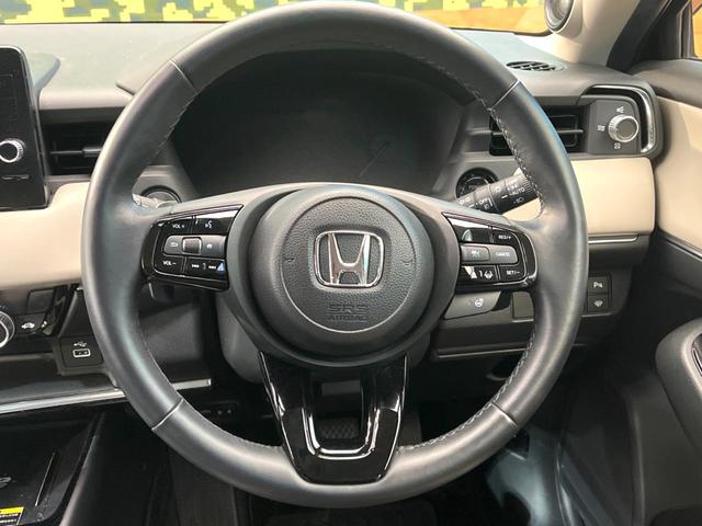 ヴェゼル ｅ：ＨＥＶ　Ｚ　禁煙車　９インチホンダコネクトディスプレイ　全周囲カメラ　アダプティブクルーズ　ホンダセンシング　純正１８インチアルミ　シーケンシャルターンランプ　パドルシフト　ハーフレザーシート　ＥＴＣ（11枚目）