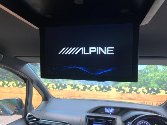 エスクァイア Gi プレミアムパッケージ ブラックテーラード 両側電動ドア 後席モニター バックカメラ 衝突被害軽減システム 禁煙車 ハーフレザーシート ドラレコ コーナーセンサー スマートキー LEDヘッド ビルトインETC クルコン 純正15インチアルミ(5枚目)