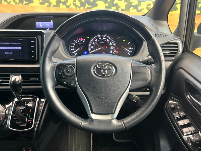 エスクァイア Gi プレミアムパッケージ ブラックテーラード 両側電動ドア 後席モニター バックカメラ 衝突被害軽減システム 禁煙車 ハーフレザーシート ドラレコ コーナーセンサー スマートキー LEDヘッド ビルトインETC クルコン 純正15インチアルミ(11枚目)