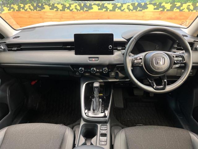 ヴェゼル ｅ：ＨＥＶ　Ｚ　メーカーナビ　ホンダセンシング　レーダークルーズ　ブラインドスポットモニター　バックカメラ　パワーバックドア　ＥＴＣ２．０　ハンドルヒーター　フルセグ　Ｂｌｕｅｔｏｏｔｈ　スマートキー　置くだけ充電（2枚目）