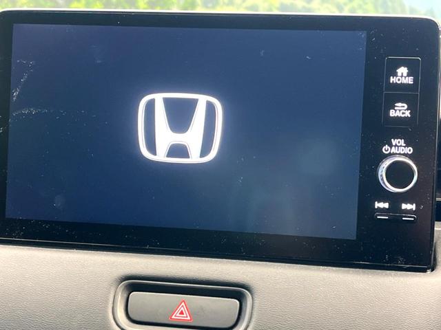 ヴェゼル ｅ：ＨＥＶ　Ｚ　メーカーナビ　ホンダセンシング　レーダークルーズ　ブラインドスポットモニター　バックカメラ　パワーバックドア　ＥＴＣ２．０　ハンドルヒーター　フルセグ　Ｂｌｕｅｔｏｏｔｈ　スマートキー　置くだけ充電（3枚目）