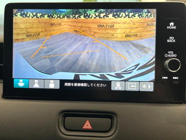 ヴェゼル ｅ：ＨＥＶ　Ｚ　メーカーナビ　ホンダセンシング　レーダークルーズ　ブラインドスポットモニター　バックカメラ　パワーバックドア　ＥＴＣ２．０　ハンドルヒーター　フルセグ　Ｂｌｕｅｔｏｏｔｈ　スマートキー　置くだけ充電（4枚目）