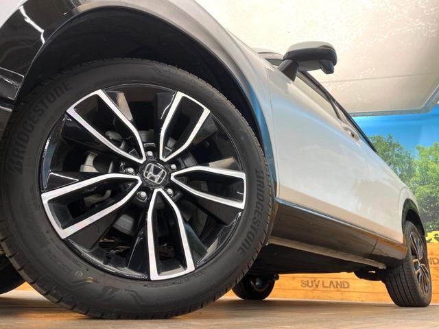 ヴェゼル ｅ：ＨＥＶ　Ｚ　メーカーナビ　ホンダセンシング　レーダークルーズ　ブラインドスポットモニター　バックカメラ　パワーバックドア　ＥＴＣ２．０　ハンドルヒーター　フルセグ　Ｂｌｕｅｔｏｏｔｈ　スマートキー　置くだけ充電（13枚目）
