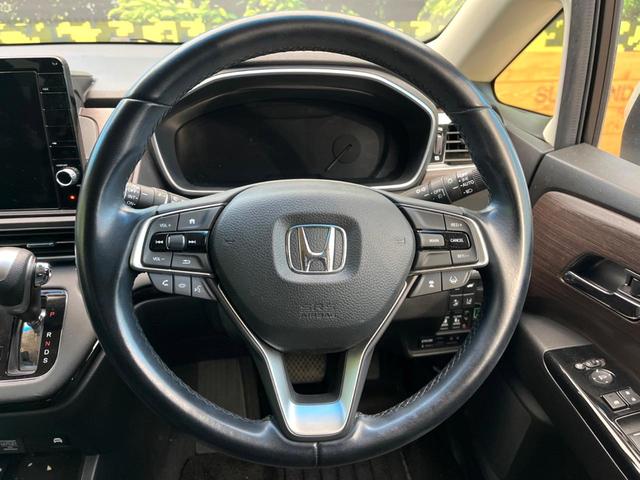 オデッセイハイブリッド ｅ：ＨＥＶアブソルート・ＥＸ　両側電動ドア　後席モニター　ホンダセンシング　レーダークルーズコントロール　電動リアゲート　コーナーセンサー　全周囲カメラ　ＥＴＣ２．０　ドラレコ　スマートキー　ＬＥＤヘッド　車線逸脱防止（12枚目）