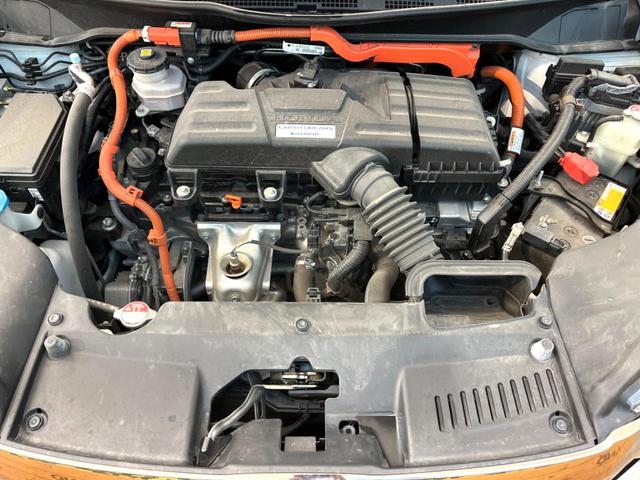 オデッセイハイブリッド ｅ：ＨＥＶアブソルート・ＥＸ　両側電動ドア　後席モニター　ホンダセンシング　レーダークルーズコントロール　電動リアゲート　コーナーセンサー　全周囲カメラ　ＥＴＣ２．０　ドラレコ　スマートキー　ＬＥＤヘッド　車線逸脱防止（18枚目）