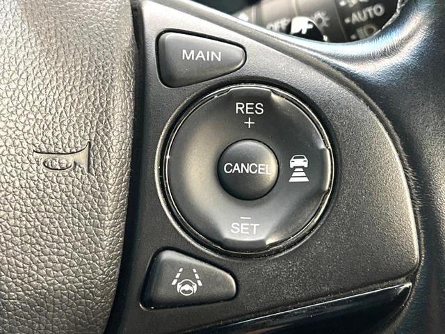 ヴェゼル ハイブリッドＲＳ・ホンダセンシング　純正ＳＤナビ　バックカメラ　衝突被害軽減システム　禁煙車　ハーフレザーシート　スマートキー　ＬＥＤヘッド　ビルトインＥＴＣ　純正１８インチアルミ　車線逸脱警報　オートライト　デュアルエアコン（4枚目）