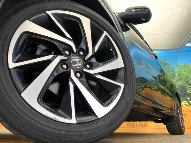 ヴェゼル ハイブリッドＲＳ・ホンダセンシング　純正ＳＤナビ　バックカメラ　衝突被害軽減システム　禁煙車　ハーフレザーシート　スマートキー　ＬＥＤヘッド　ビルトインＥＴＣ　純正１８インチアルミ　車線逸脱警報　オートライト　デュアルエアコン（13枚目）