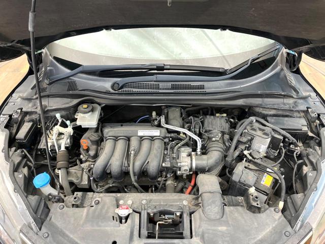 ヴェゼル ハイブリッドＲＳ・ホンダセンシング　純正ＳＤナビ　バックカメラ　衝突被害軽減システム　禁煙車　ハーフレザーシート　スマートキー　ＬＥＤヘッド　ビルトインＥＴＣ　純正１８インチアルミ　車線逸脱警報　オートライト　デュアルエアコン（18枚目）