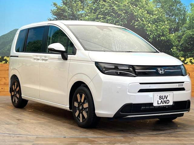 フリード エアー　ＥＸ　登録済未使用車　両側電動ドア　衝突被害軽減システム　レーダークルーズ　スマートキー　ＬＥＤヘッド　純正１５インチアルミ　オートハイビーム　車線逸脱警報　オートライト　オートエアコン（24枚目）