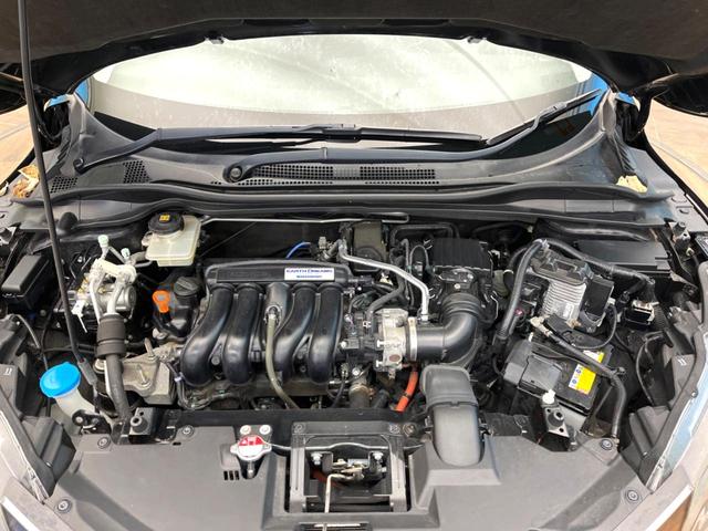 ヴェゼル ハイブリッドＺ　禁煙車　純正ＳＤナビ　バックカメラ　衝突被害軽減システム　ハーフレザーシート　スマートキー　ＬＥＤヘッド　ビルトインＥＴＣ　クルコン　純正１７インチアルミ　オートライト　デュアルエアコン（18枚目）