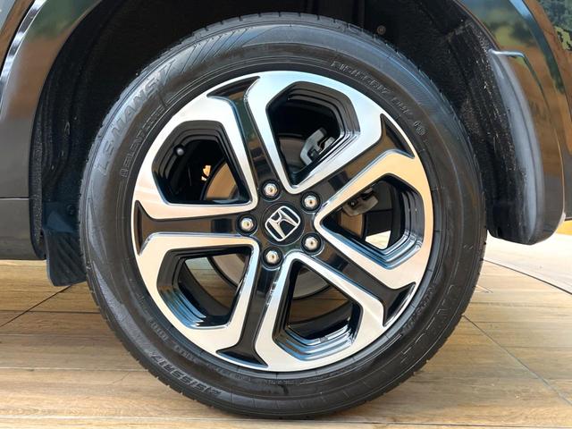 ヴェゼル ハイブリッドＺ　禁煙車　純正ＳＤナビ　バックカメラ　衝突被害軽減システム　ハーフレザーシート　スマートキー　ＬＥＤヘッド　ビルトインＥＴＣ　クルコン　純正１７インチアルミ　オートライト　デュアルエアコン（24枚目）