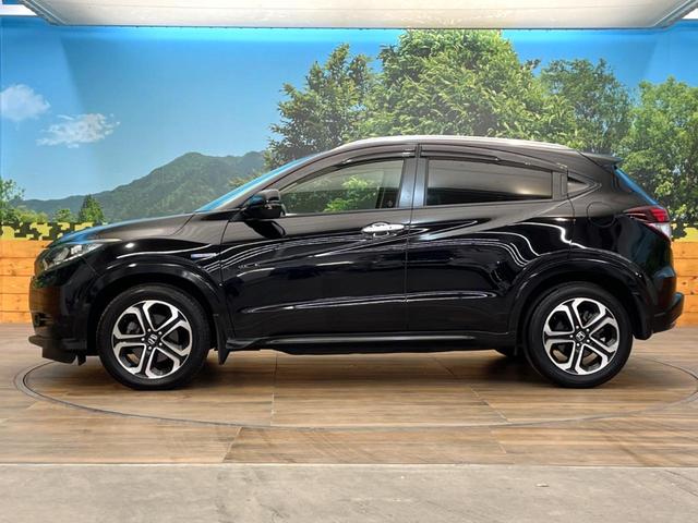 ヴェゼル ハイブリッドＺ　禁煙車　純正ＳＤナビ　バックカメラ　衝突被害軽減システム　ハーフレザーシート　スマートキー　ＬＥＤヘッド　ビルトインＥＴＣ　クルコン　純正１７インチアルミ　オートライト　デュアルエアコン（28枚目）