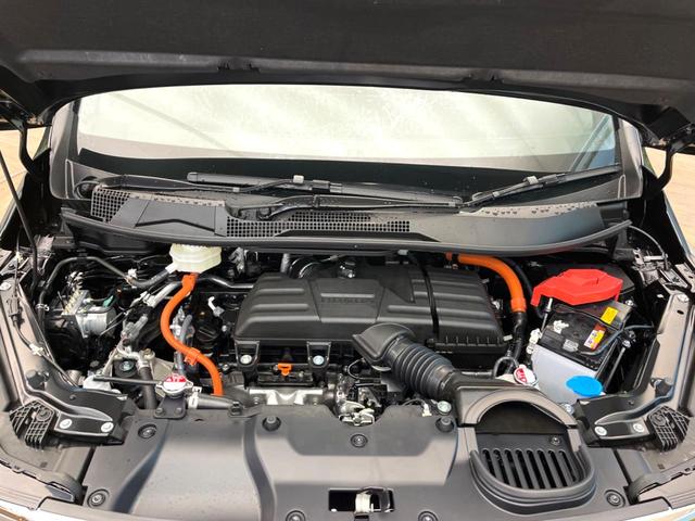 ステップワゴン ｅ：ＨＥＶスパーダ　登録済未使用車　両側電動スライドドア　ブラインドスポットインフォメーション　シートヒーター　電動リアゲート　レーダークルーズ　パドルシフト　ＵＳＢ入力端子　純正１６インチアルミ　ＬＥＤヘッド（18枚目）