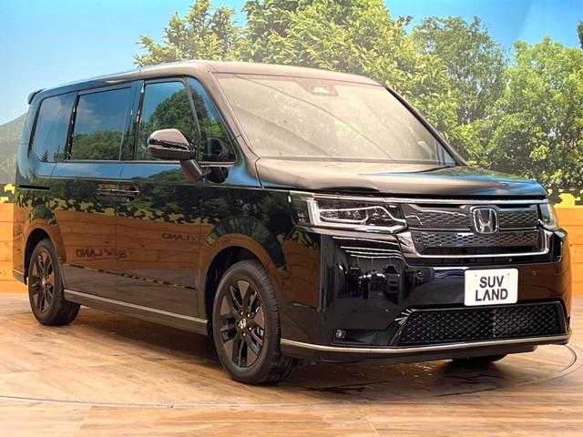 ステップワゴン ｅ：ＨＥＶスパーダ　登録済未使用車　両側電動スライドドア　ブラインドスポットインフォメーション　シートヒーター　電動リアゲート　レーダークルーズ　パドルシフト　ＵＳＢ入力端子　純正１６インチアルミ　ＬＥＤヘッド（26枚目）