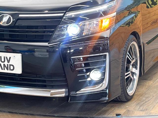 ヴォクシー ＺＳ　禁煙車　電動スライドドア　ＳＤナビ　後席モニター　バックカメラ　衝突被害軽減システム　レザーシート　スマートキー　ＬＥＤヘッド　ビルトインＥＴＣ　オートライト　デュアルエアコン　Ｂｌｕｅｔｏｏｔｈ（13枚目）