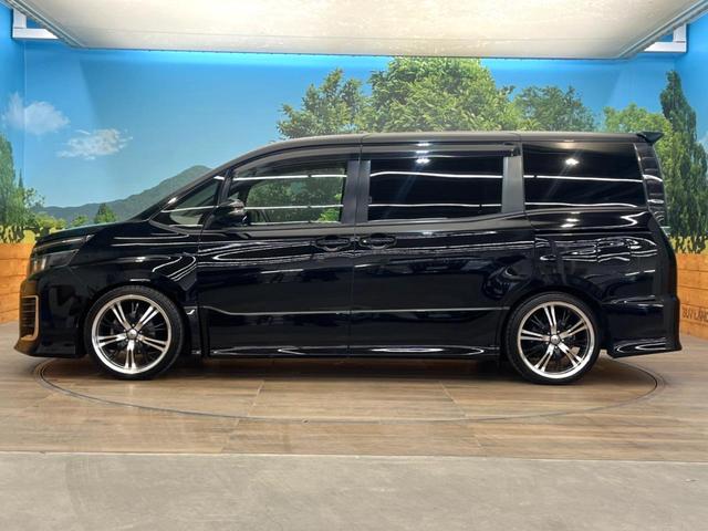 ヴォクシー ＺＳ　禁煙車　電動スライドドア　ＳＤナビ　後席モニター　バックカメラ　衝突被害軽減システム　レザーシート　スマートキー　ＬＥＤヘッド　ビルトインＥＴＣ　オートライト　デュアルエアコン　Ｂｌｕｅｔｏｏｔｈ（26枚目）