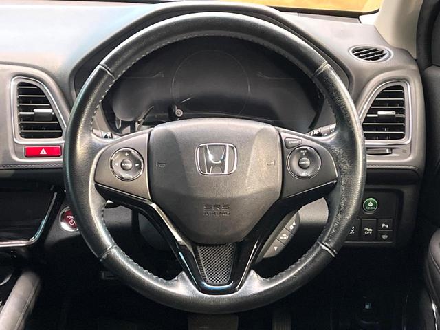 ヴェゼル ハイブリッドＺ　禁煙車　純正８インチナビ　バックカメラ　寒冷地仕様　シティブレーキアクティブシステム　ハーフレザーシート　ドラレコ　コーナーセンサー　スマートキー　ＬＥＤヘッド　ルーフレール　ＥＴＣ　クルコン（11枚目）