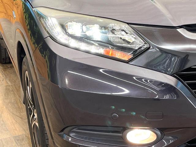 ヴェゼル ハイブリッドＺ　禁煙車　純正８インチナビ　バックカメラ　寒冷地仕様　シティブレーキアクティブシステム　ハーフレザーシート　ドラレコ　コーナーセンサー　スマートキー　ＬＥＤヘッド　ルーフレール　ＥＴＣ　クルコン（12枚目）