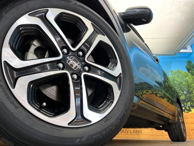 ヴェゼル ハイブリッドＺ　禁煙車　純正８インチナビ　バックカメラ　寒冷地仕様　シティブレーキアクティブシステム　ハーフレザーシート　ドラレコ　コーナーセンサー　スマートキー　ＬＥＤヘッド　ルーフレール　ＥＴＣ　クルコン（13枚目）