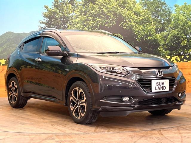 ヴェゼル ハイブリッドＺ　禁煙車　純正８インチナビ　バックカメラ　寒冷地仕様　シティブレーキアクティブシステム　ハーフレザーシート　ドラレコ　コーナーセンサー　スマートキー　ＬＥＤヘッド　ルーフレール　ＥＴＣ　クルコン（16枚目）