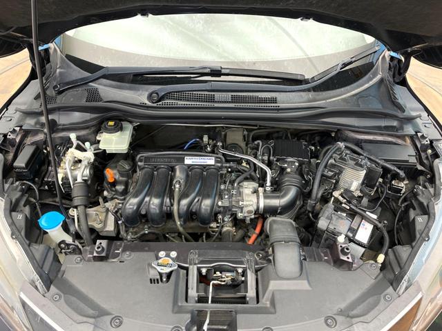 ヴェゼル ハイブリッドＺ　禁煙車　純正８インチナビ　バックカメラ　寒冷地仕様　シティブレーキアクティブシステム　ハーフレザーシート　ドラレコ　コーナーセンサー　スマートキー　ＬＥＤヘッド　ルーフレール　ＥＴＣ　クルコン（18枚目）