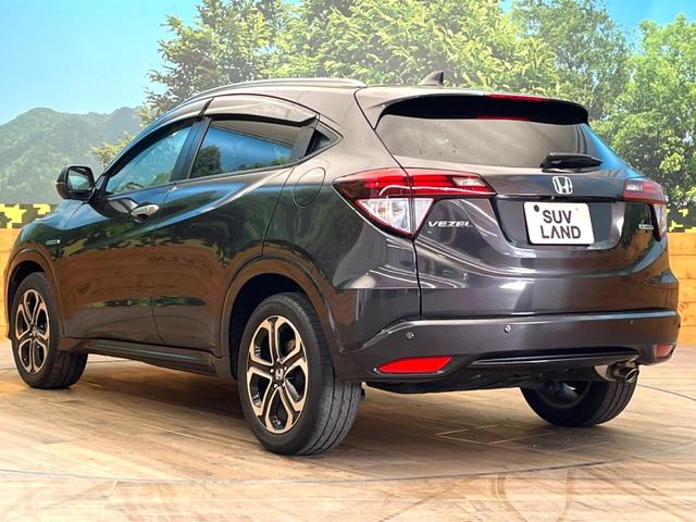 ヴェゼル ハイブリッドＺ　禁煙車　純正８インチナビ　バックカメラ　寒冷地仕様　シティブレーキアクティブシステム　ハーフレザーシート　ドラレコ　コーナーセンサー　スマートキー　ＬＥＤヘッド　ルーフレール　ＥＴＣ　クルコン（26枚目）