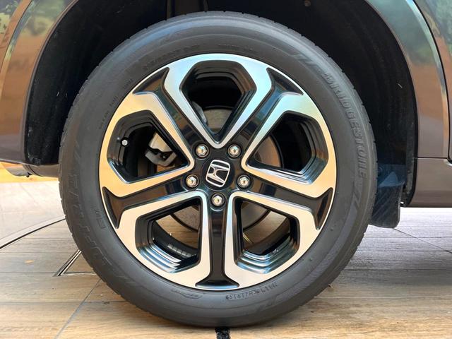 ヴェゼル ハイブリッドＺ　禁煙車　純正８インチナビ　バックカメラ　寒冷地仕様　シティブレーキアクティブシステム　ハーフレザーシート　ドラレコ　コーナーセンサー　スマートキー　ＬＥＤヘッド　ルーフレール　ＥＴＣ　クルコン（29枚目）