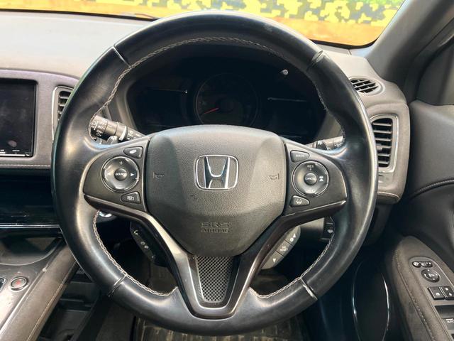 ヴェゼル ハイブリッドＲＳ・ホンダセンシング　禁煙車　純正７インチナビ　バックカメラ　ホンダセンシング　ハーフレザーシート　ドラレコ　スマートキー　ＬＥＤヘッド　ビルトインＥＴＣ　純正１８インチアルミ　車線逸脱警報　オートライト（11枚目）