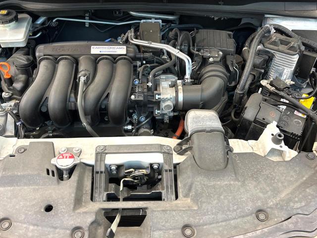 ヴェゼル ハイブリッドＲＳ・ホンダセンシング　禁煙車　純正７インチナビ　バックカメラ　ホンダセンシング　ハーフレザーシート　ドラレコ　スマートキー　ＬＥＤヘッド　ビルトインＥＴＣ　純正１８インチアルミ　車線逸脱警報　オートライト（18枚目）