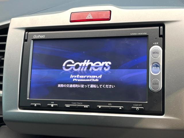 フリードハイブリッド ハイブリッド　プレミアムエディション　両側電動ドア　純正ＳＤナビ　バックカメラ　ハーフレザーシート　ドラレコ　スマートキー　ＨＩＤヘッド　ビルトインＥＴＣ　クルコン　オートライト　オートエアコン　ＣＤ　ＤＶＤ再生　地デジ（3枚目）