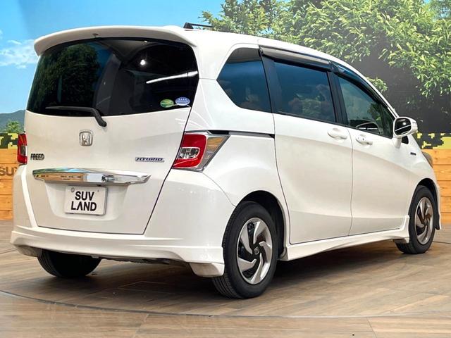 フリードハイブリッド ハイブリッド　プレミアムエディション　両側電動ドア　純正ＳＤナビ　バックカメラ　ハーフレザーシート　ドラレコ　スマートキー　ＨＩＤヘッド　ビルトインＥＴＣ　クルコン　オートライト　オートエアコン　ＣＤ　ＤＶＤ再生　地デジ（17枚目）