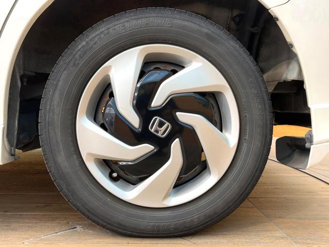 フリードハイブリッド ハイブリッド　プレミアムエディション　両側電動ドア　純正ＳＤナビ　バックカメラ　ハーフレザーシート　ドラレコ　スマートキー　ＨＩＤヘッド　ビルトインＥＴＣ　クルコン　オートライト　オートエアコン　ＣＤ　ＤＶＤ再生　地デジ（24枚目）