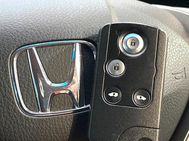 フリードハイブリッド ハイブリッド　プレミアムエディション　両側電動ドア　純正ＳＤナビ　バックカメラ　ハーフレザーシート　ドラレコ　スマートキー　ＨＩＤヘッド　ビルトインＥＴＣ　クルコン　オートライト　オートエアコン　ＣＤ　ＤＶＤ再生　地デジ（53枚目）