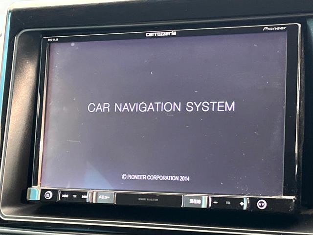 ヴォクシー ZS 煌 SDナビ バックカメラ 両側電動スライド アイドリングストップ LEDヘッド ETC スマートキー 横滑り防止装置 革巻きステアリング マニュアルモード付 デュアルエアコン 純正16インチアルミ(3枚目)