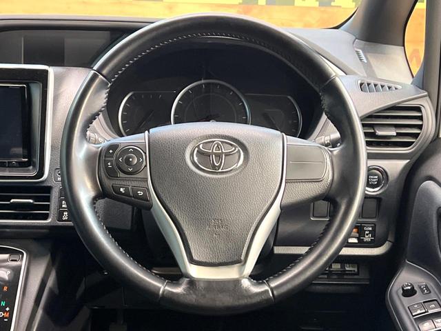 ヴォクシー ZS 煌 SDナビ バックカメラ 両側電動スライド アイドリングストップ LEDヘッド ETC スマートキー 横滑り防止装置 革巻きステアリング マニュアルモード付 デュアルエアコン 純正16インチアルミ(12枚目)