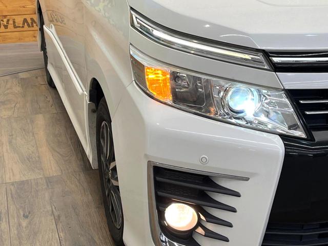 ヴォクシー ZS 煌 SDナビ バックカメラ 両側電動スライド アイドリングストップ LEDヘッド ETC スマートキー 横滑り防止装置 革巻きステアリング マニュアルモード付 デュアルエアコン 純正16インチアルミ(13枚目)