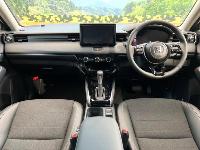 ヴェゼル ｅ：ＨＥＶ　Ｚ　ＳＤナビ　バックカメラ　ホンダセンシング　ステアリングヒーター　シートヒーター　コーナーセンサー　ブラインドビュースポットモニター　禁煙車　ＥＴＣ　ドラレコ　電動リアゲート　ハーフレザーシート（2枚目）